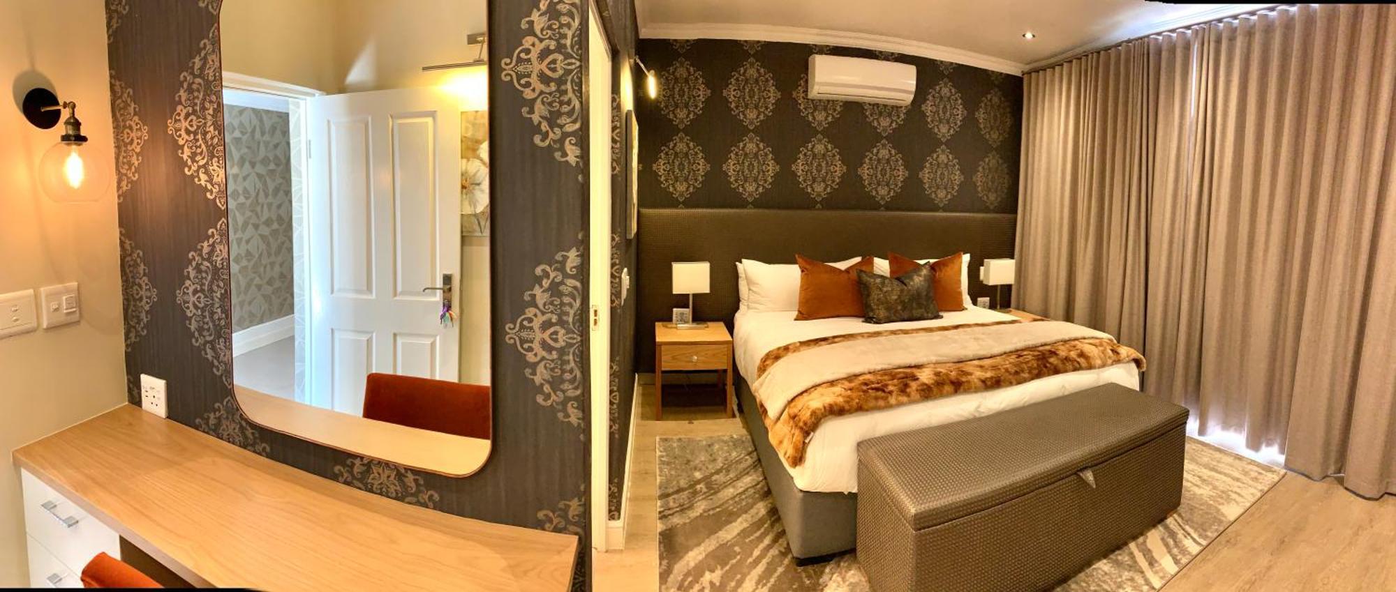 Alluvia Boutique Winery & Luxury Accommodation Stellenbosch Bilik gambar A bedroom at the Cape Heritage